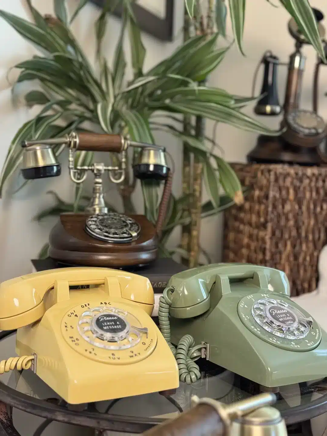 Yellow, green, and wooden LifeOnRecord telephones in a colorful display