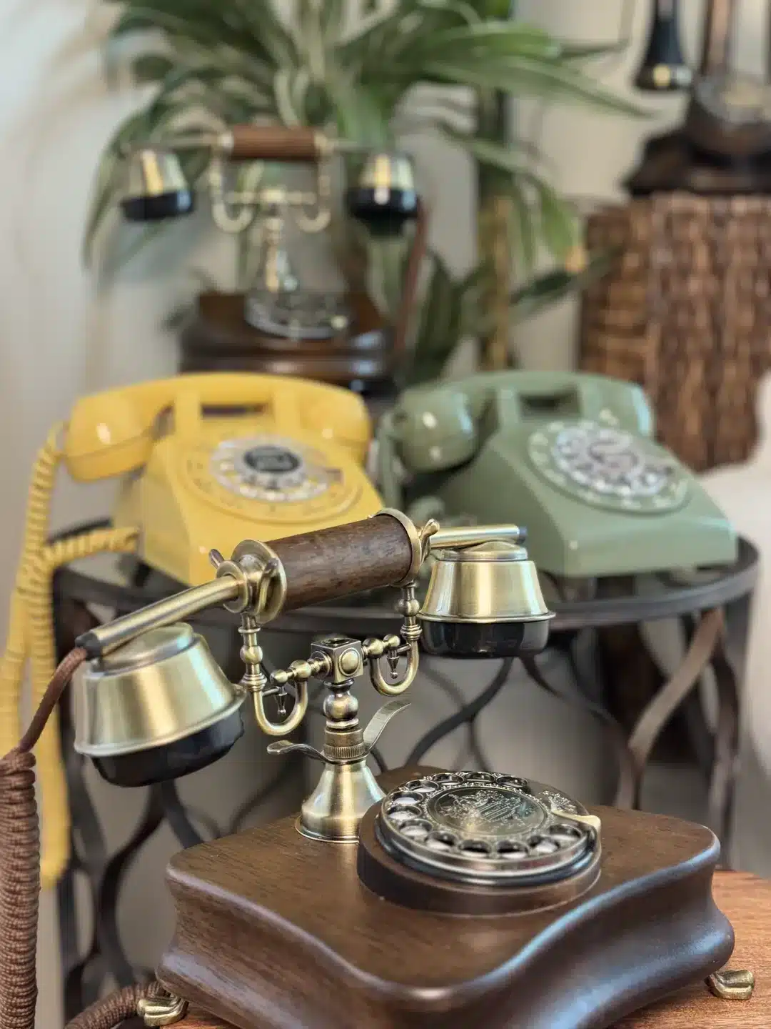 Wooden, yellow, and green LifeOnRecord telephones arranged together